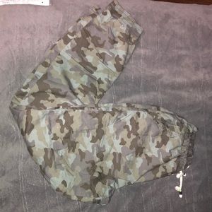 Green camouflage joggers